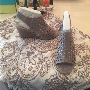 Franco Sarto suede cutout wedge sandal.