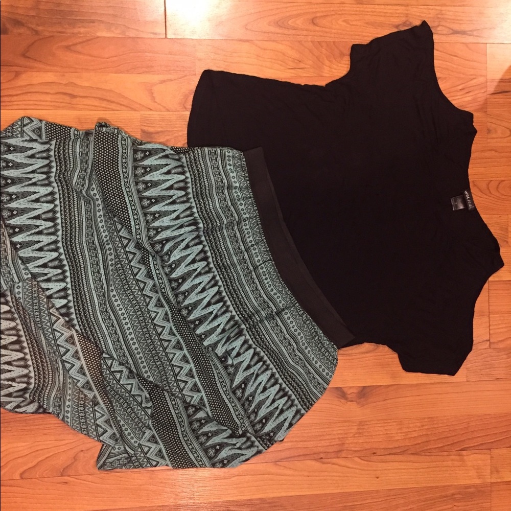 Black wet seal shoulder cut out shirt