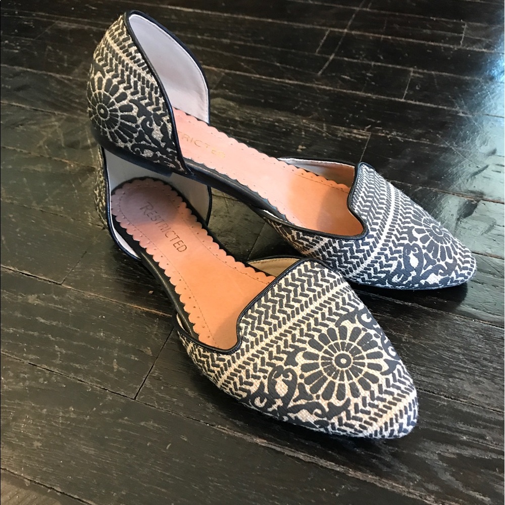 Black and cream patterned flats