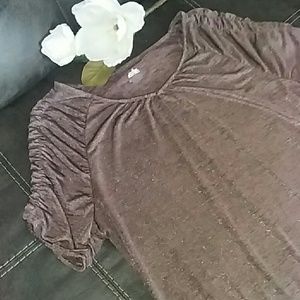 Jennifer Lopez shimmer,  quarter length sleeve top