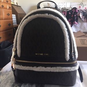 A brand new Michael Kors backpack
