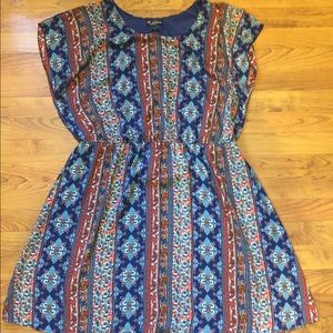 Colorful patterned A line dress.