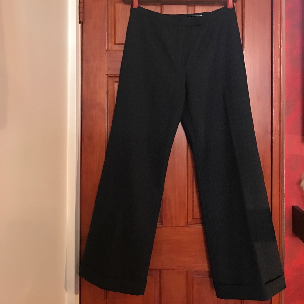 Never worn NWT light wool pants, size 12. Italy.