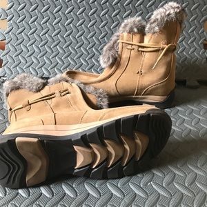 A little over ankle fur boots.  Never worn