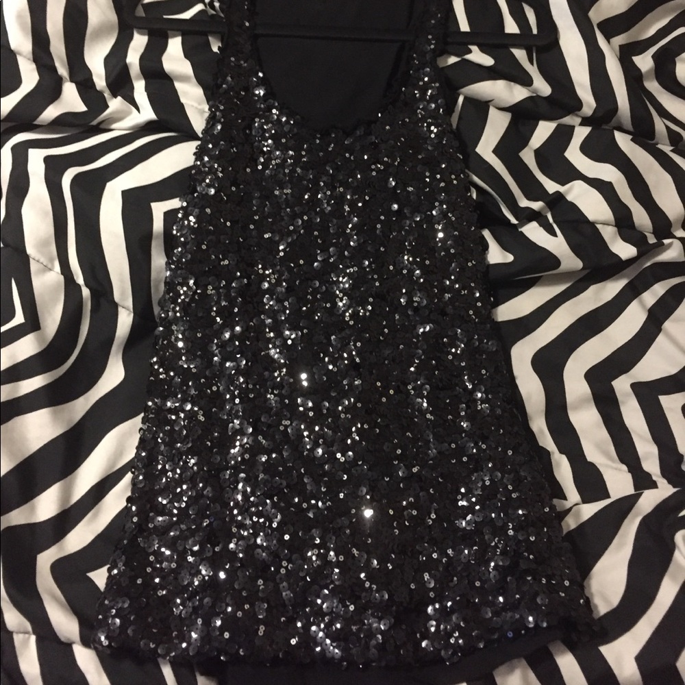 Black Sequin Express Top!
