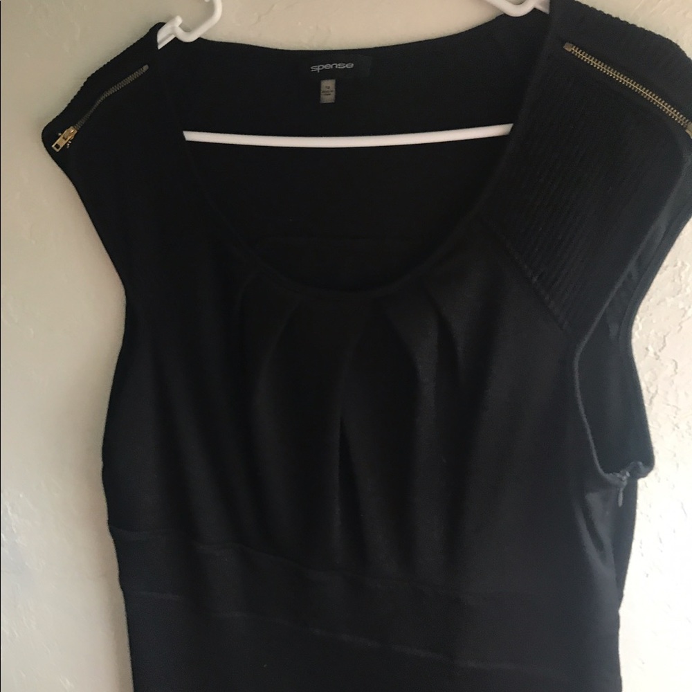 Spends LBD with gold zipper detail on shoulder