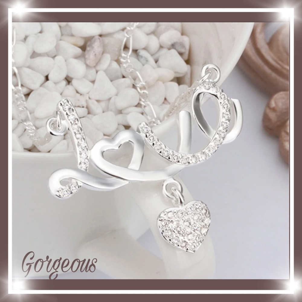 Beautiful silver Love with hanging heart necklace