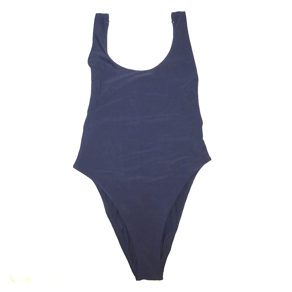 One-piece, backless swim suit.