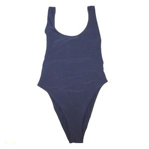 One-piece, backless swim suit.