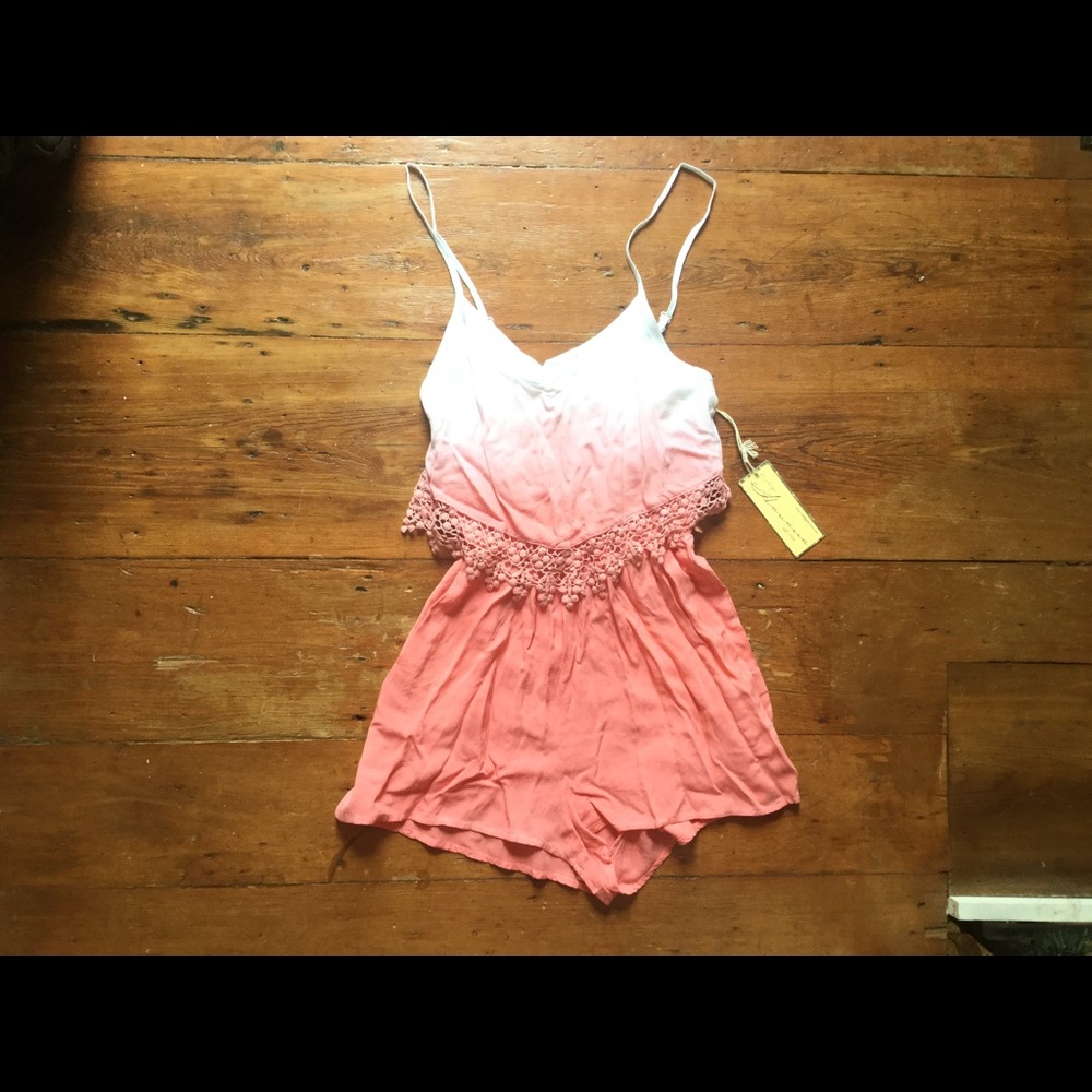 Brand new romper !!! Tags