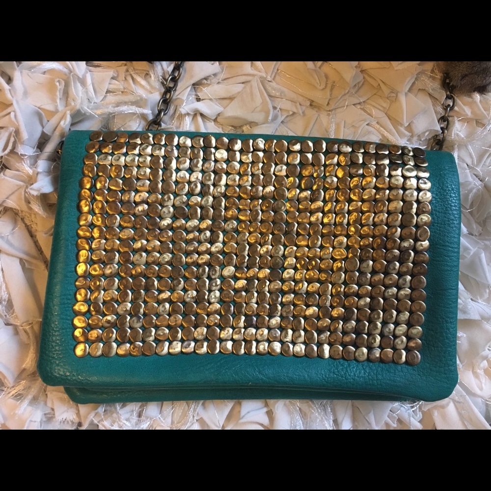 Crossbody purse : teal: metallic decor.