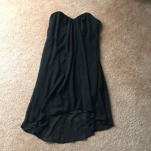 Large strapless slightly high low black dress