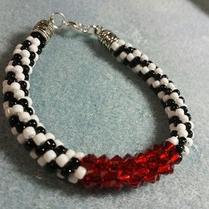 Black, white and red kumihimo bracelet