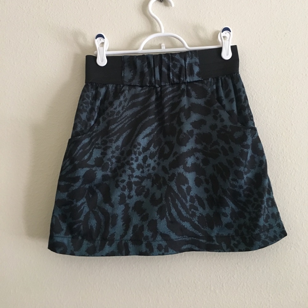 Silk leopard print & deep turquoise mini skirt.
