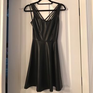 Little black flowy dress. Strappy back. Size Med.