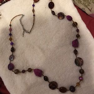 Necklace and earrings with vibrant purple colors
