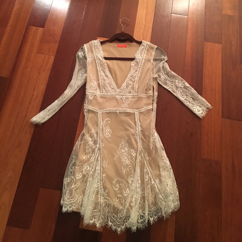 White lace and nude dress. Mid sleeve