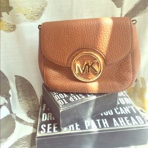 Micheal Kors lightly used Clutch/purse.