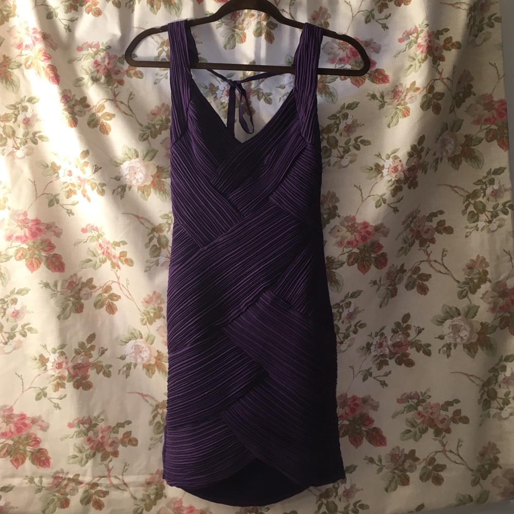 Unique form-fitted purple mini dress