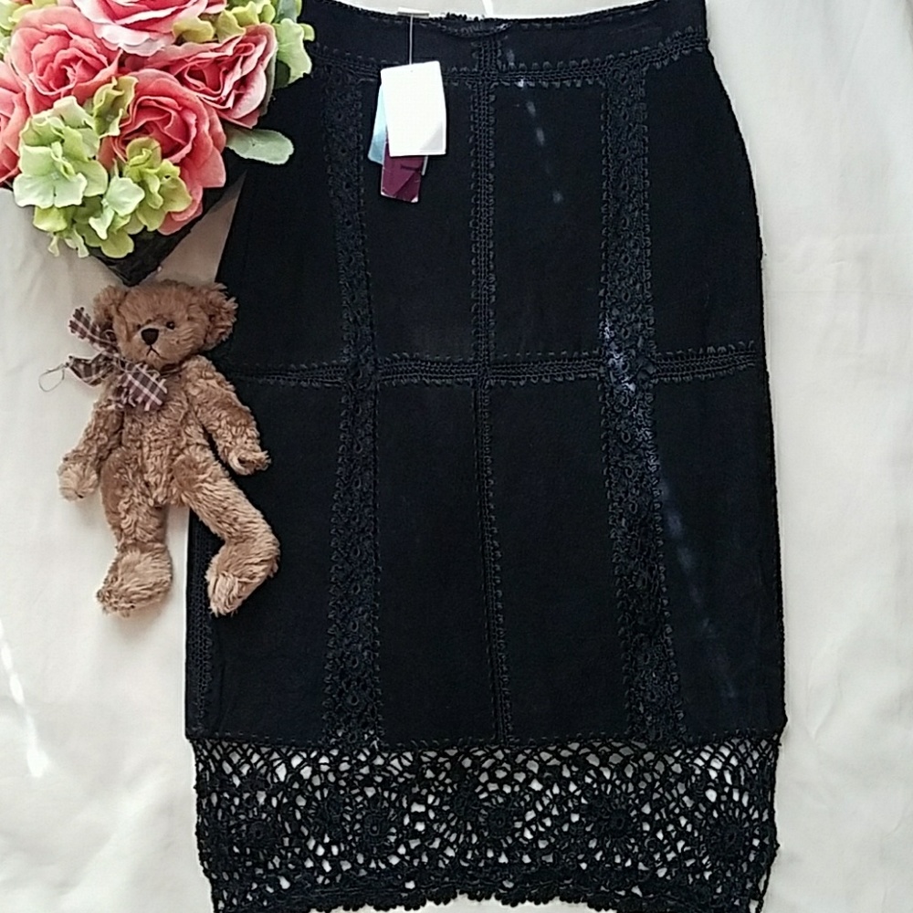 Leather and crochet midi skirt.
