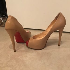 Authentic Peep toe Louboutin in great condition!