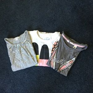 Two J. Crew shirts and one H&M shirt