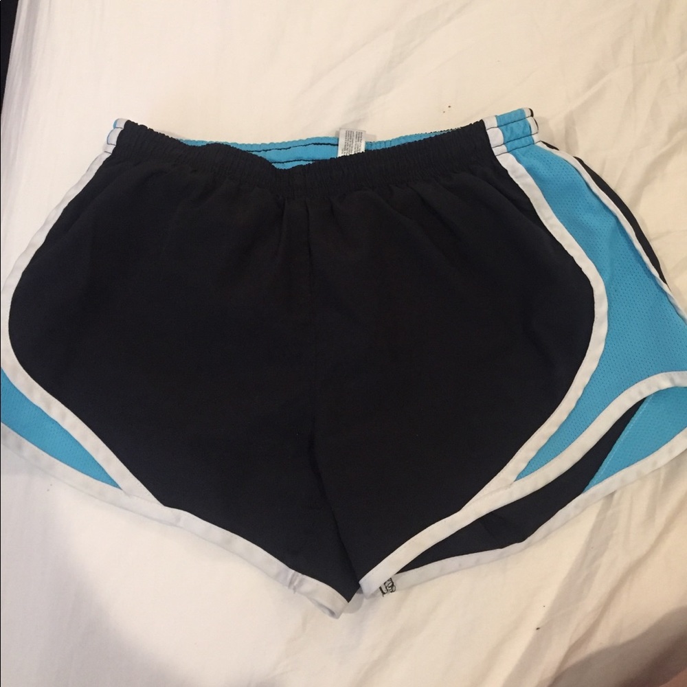 Black and blue athletic shorts by Arizona
