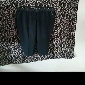 Black leather waist band with blue pants leg