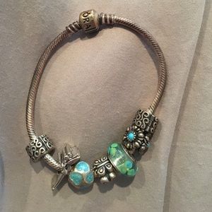 Pandora bracelet including charms