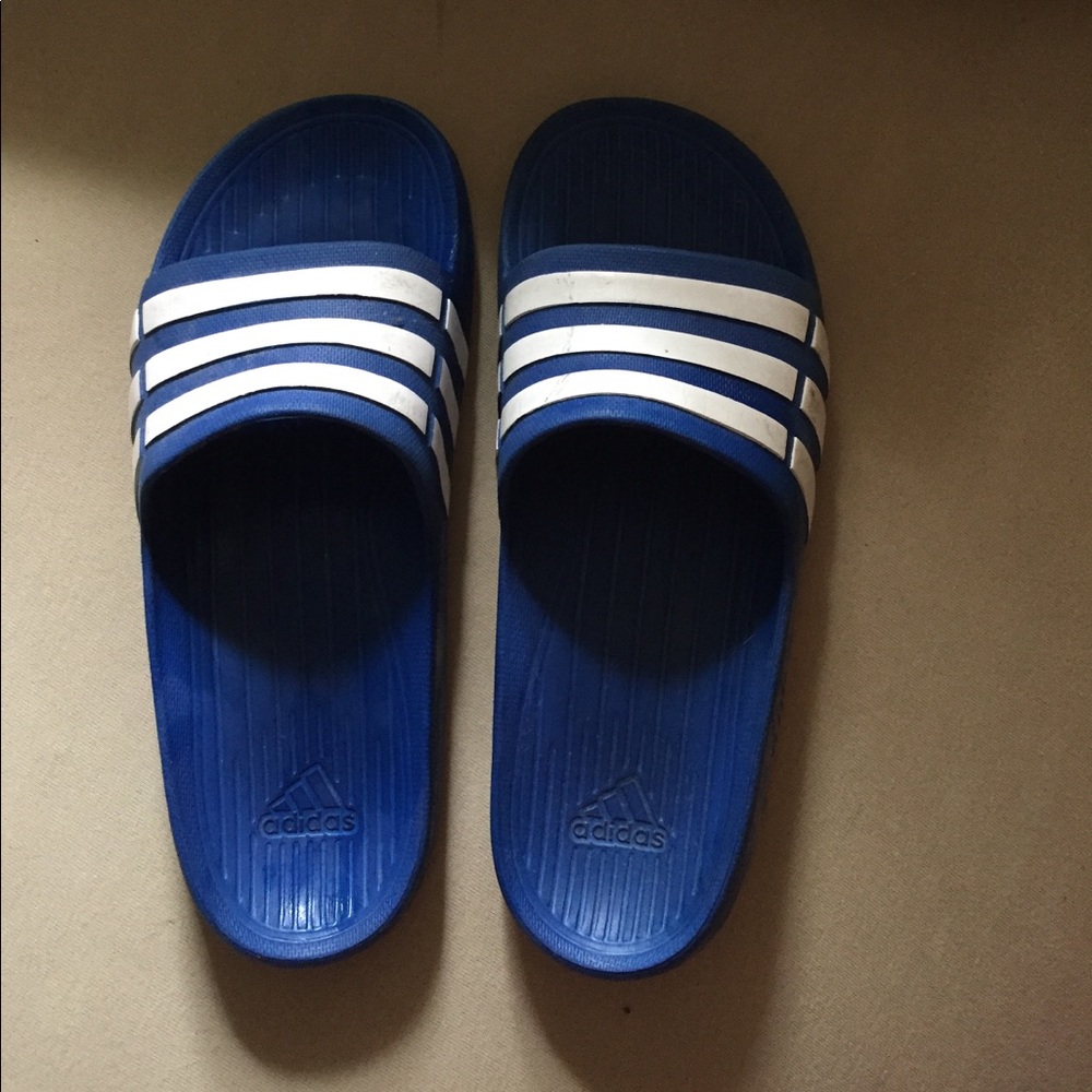 blue adidas slide ons