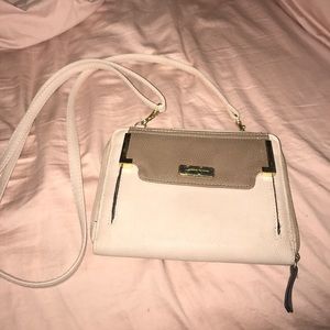 Simple and small purse with a long strap