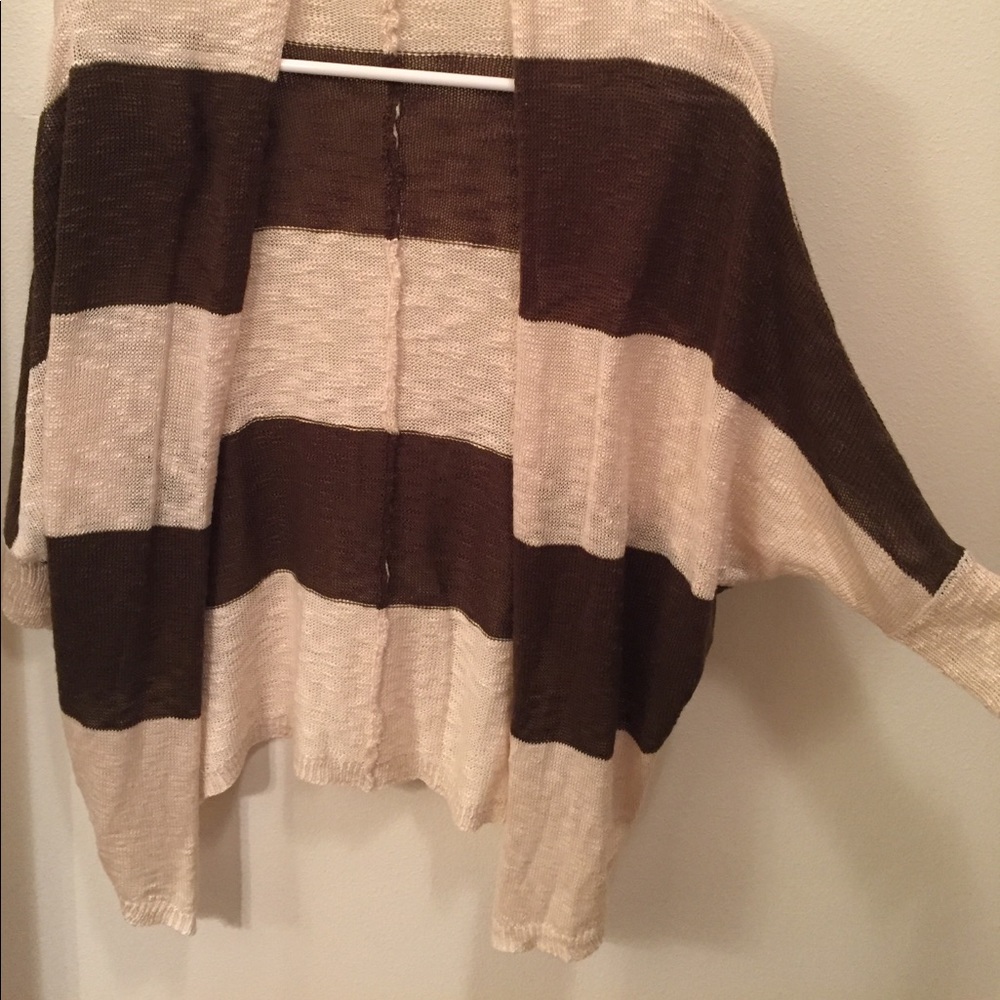 Brown and cream colored cardigan
