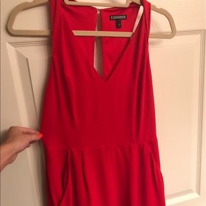 Express Red Romper with pockets. Cute back cutouts
