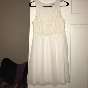 White dress with flowers embroidered