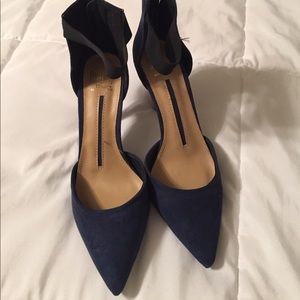 Navy Heels never worn!