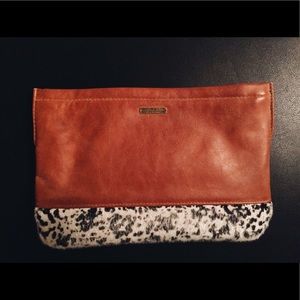 Brown leather and cow hide material clutch
