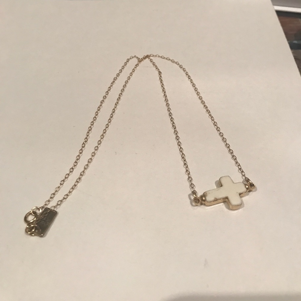 White and gold cross necklace