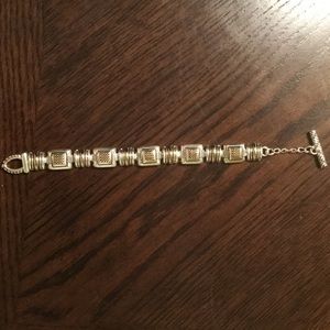 Silver bracelet with gold design in links