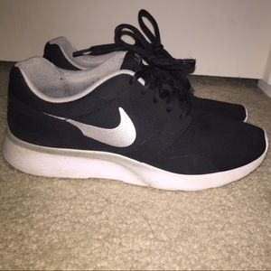 Black and white Nike shoes