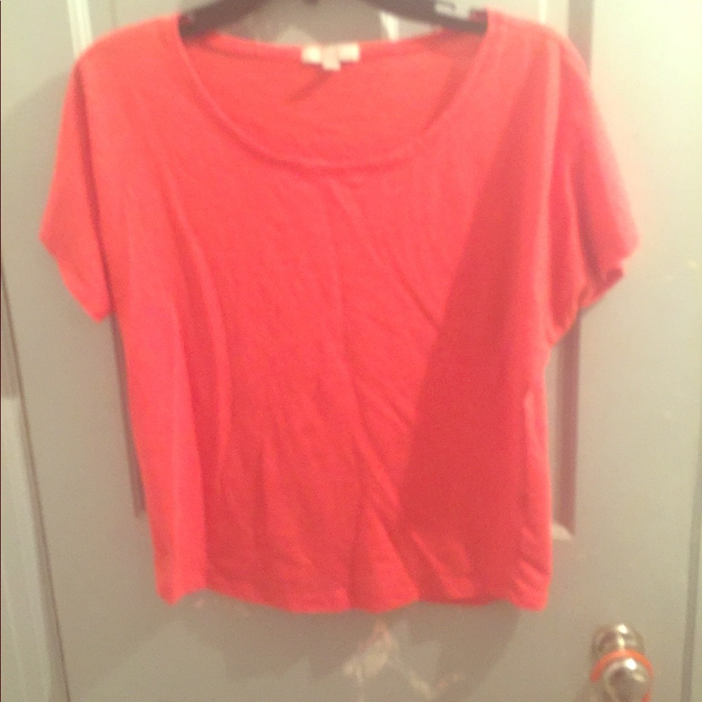 Delias small pinkish orange top