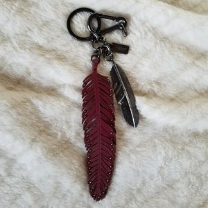Coach black cherry feather bag charm fob