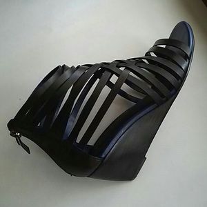 Black strappy wedge sandals with blue piping