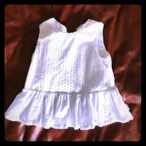 Peplum sleeveless top