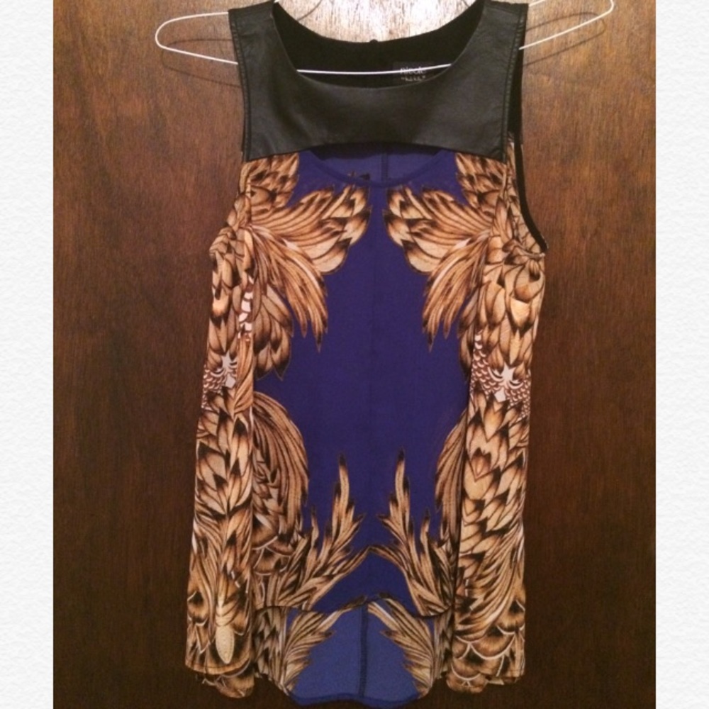 Leather and feathers sleeveless blouse