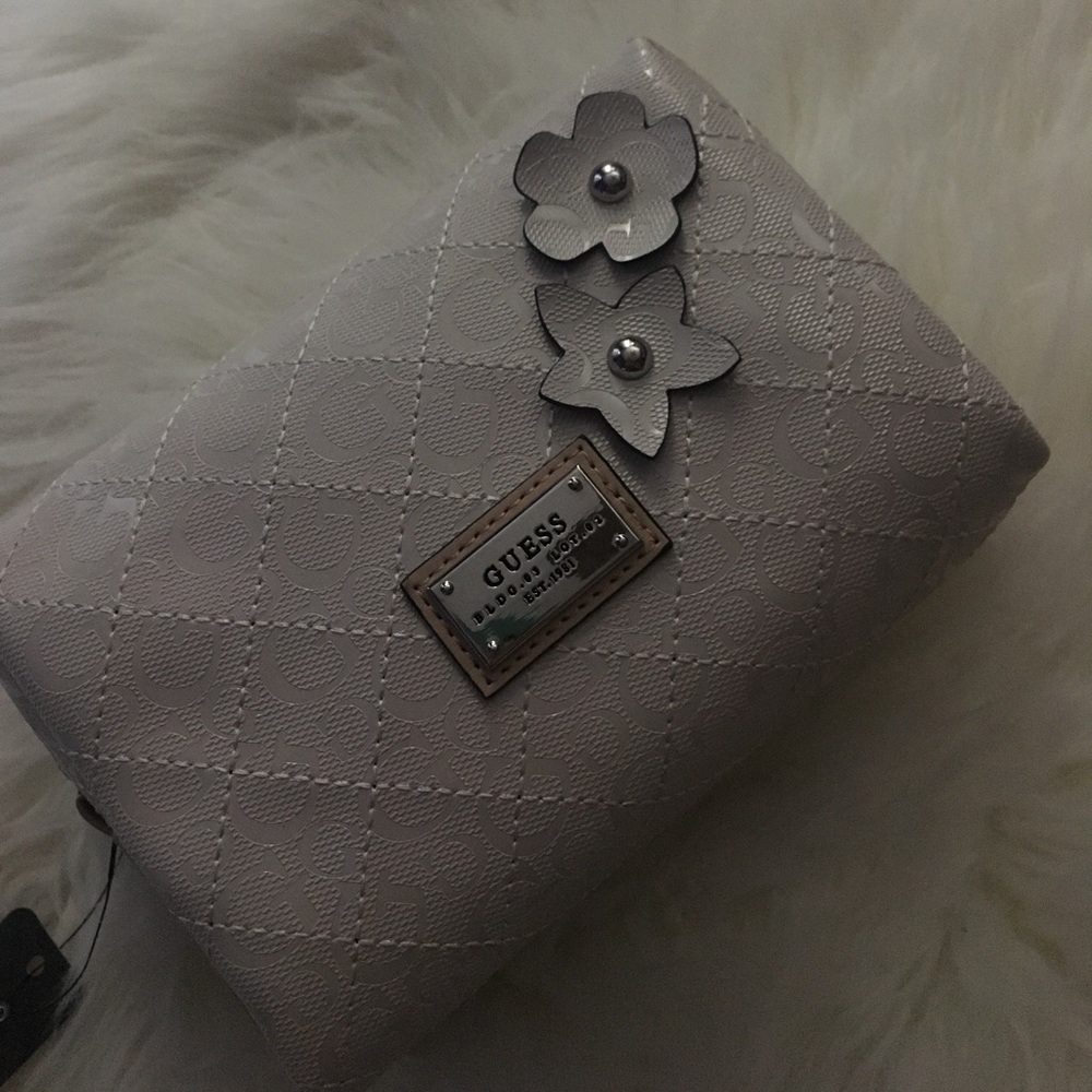 Brand new, never used Guess makeup baggie