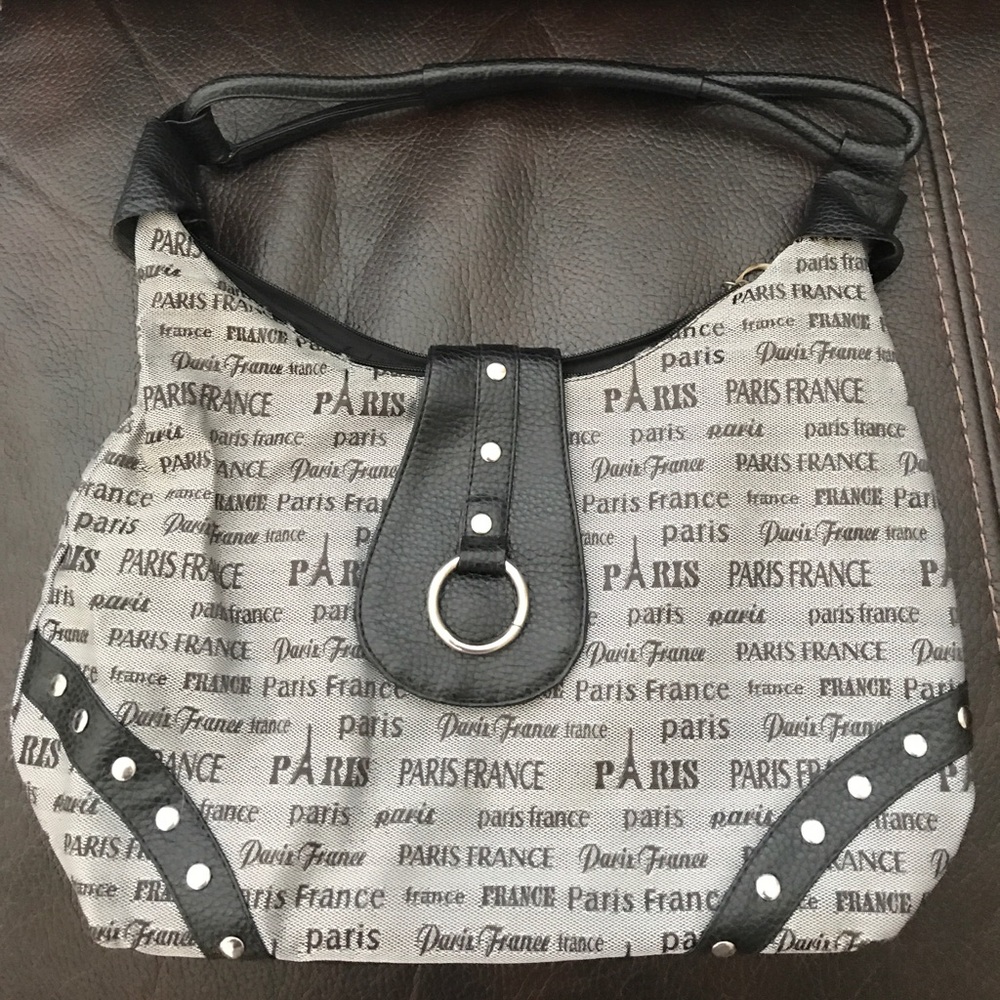 Black and grey purse bought in Paris.