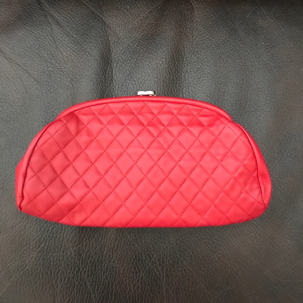 Red Chanel clutch.