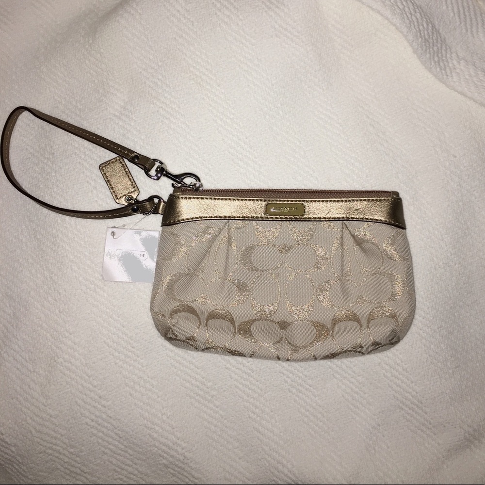 Signature Coach Gold Cream Wristlet