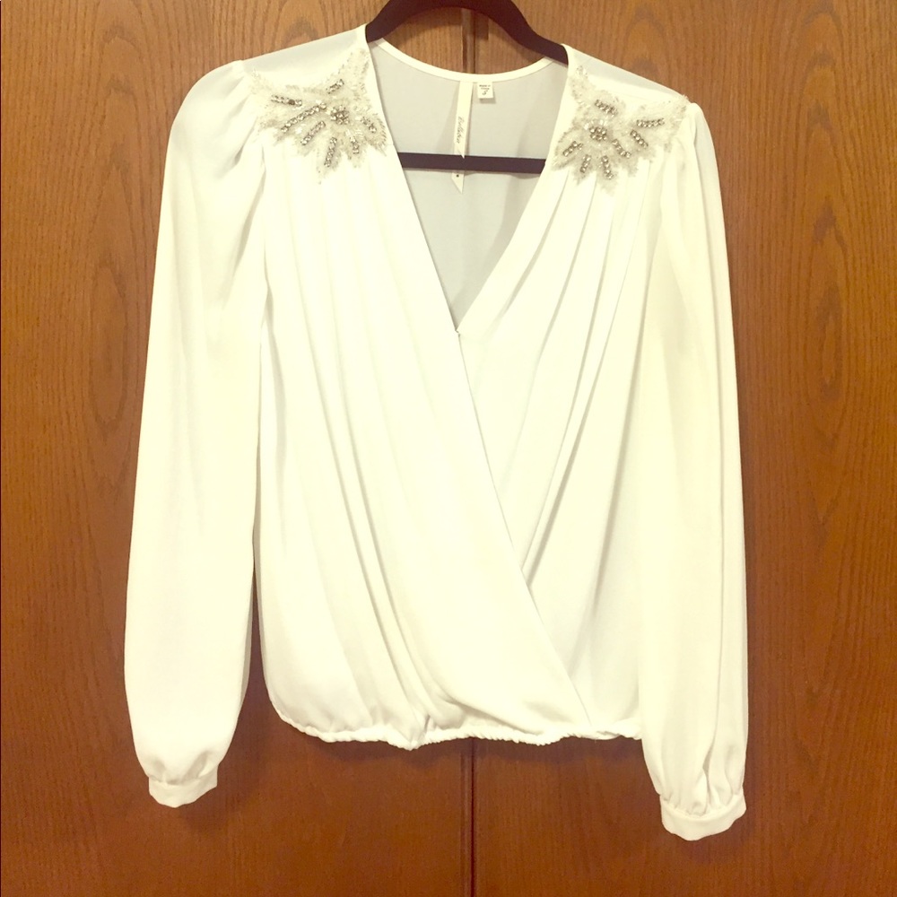 Blouse with embroidered shoulders