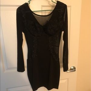 Form fitted dress with sheer panels